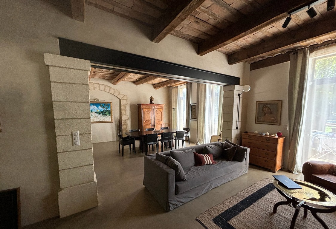 Living and dining room under old beams